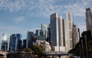 Singapore Fullerton Hotel and CBD from Cavenagh Bridge