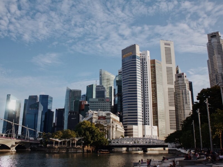Singapore Fullerton Hotel and CBD from Cavenagh Bridge