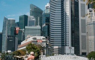 Singapore CBD professional with bicycle by Marina Bay