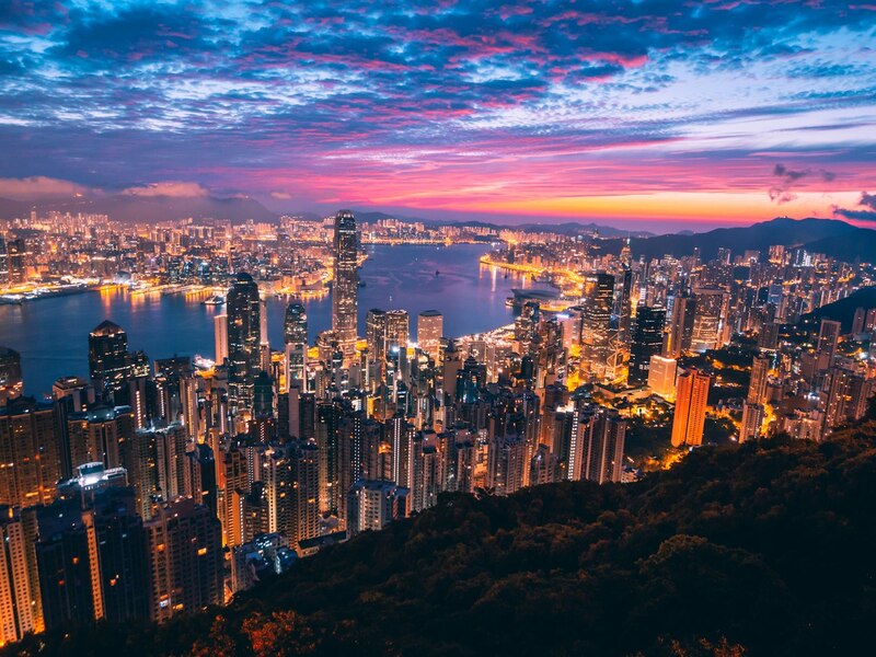 Singapore vs Hong Kong work pass tax and cost of living comparison 2026