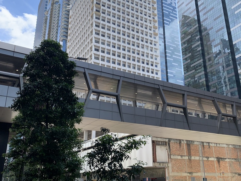 Employment Pass holder unpaid sabbatical leave compliance guide for Singapore employers, Central Business District office building