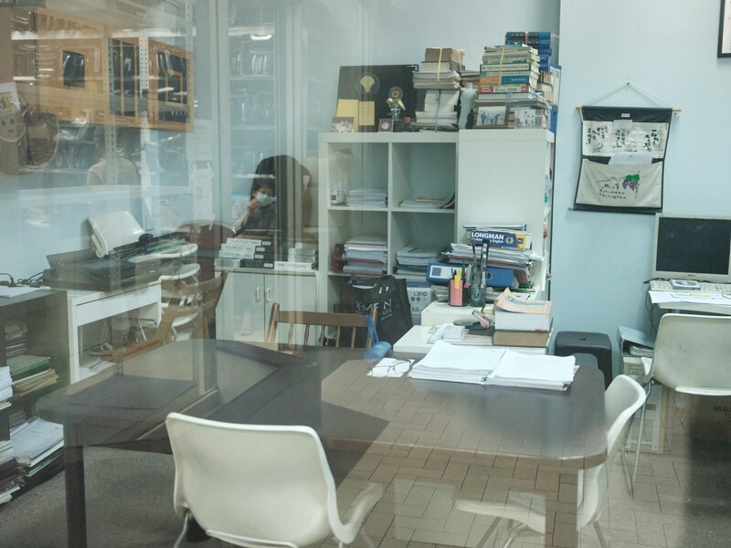 Professional reviewing documents for a career break PR application in Singapore