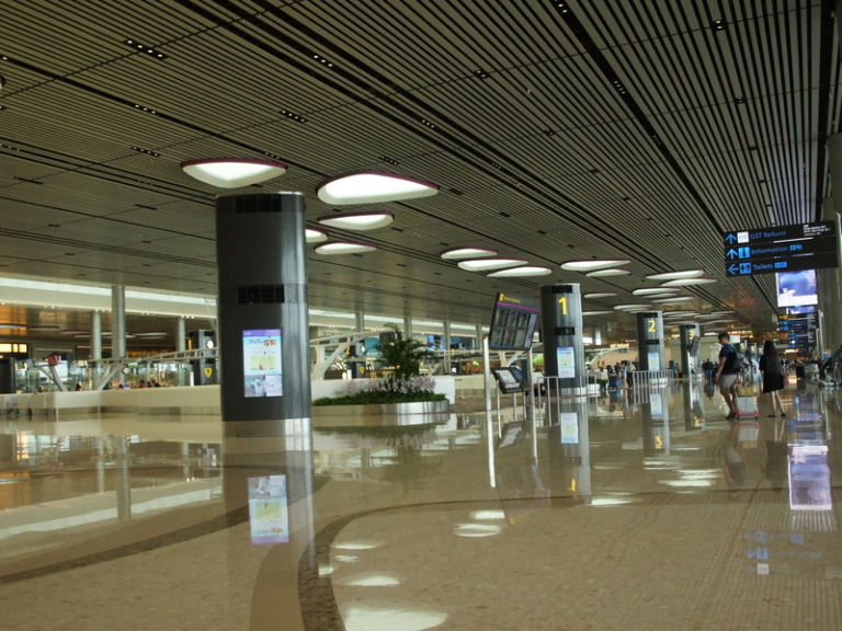 Departure hall at a Singapore airport terminal where travellers submit the enhanced SG Arrival Card