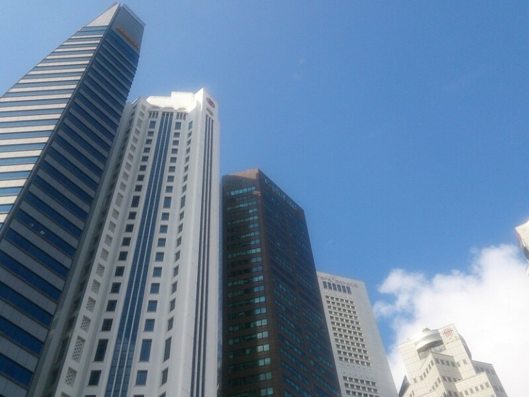 Employment Pass holder rejoins same employer in Singapore office setting