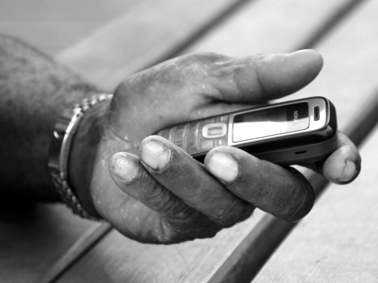 Foreigner completing SIM card registration for a Singapore mobile number