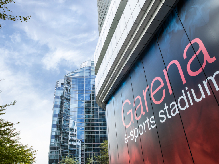 Hiring a foreign esports professional in Singapore, esports stadium representing the gaming industry work pass strategy