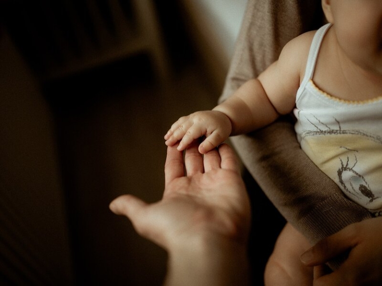 Family completing a PR application for an adopted child in Singapore with adoption order documents