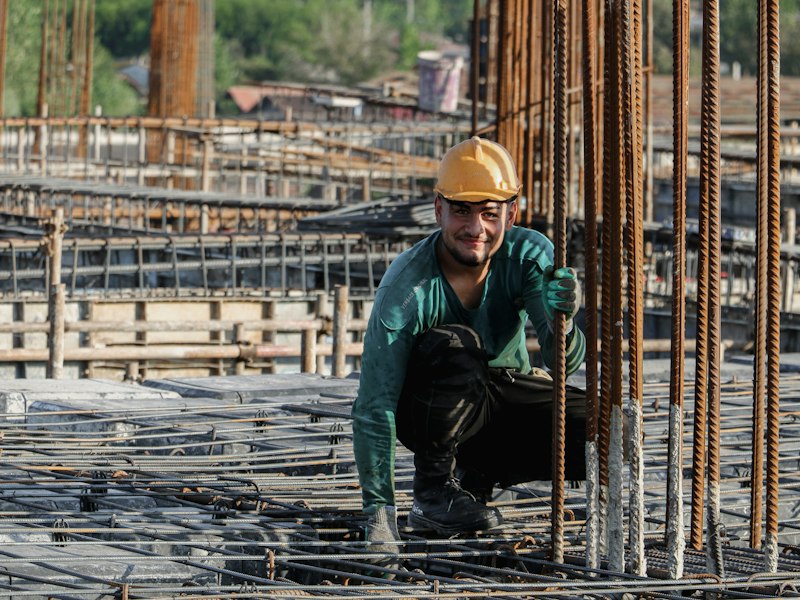 Construction worker in a hard hat working on a site