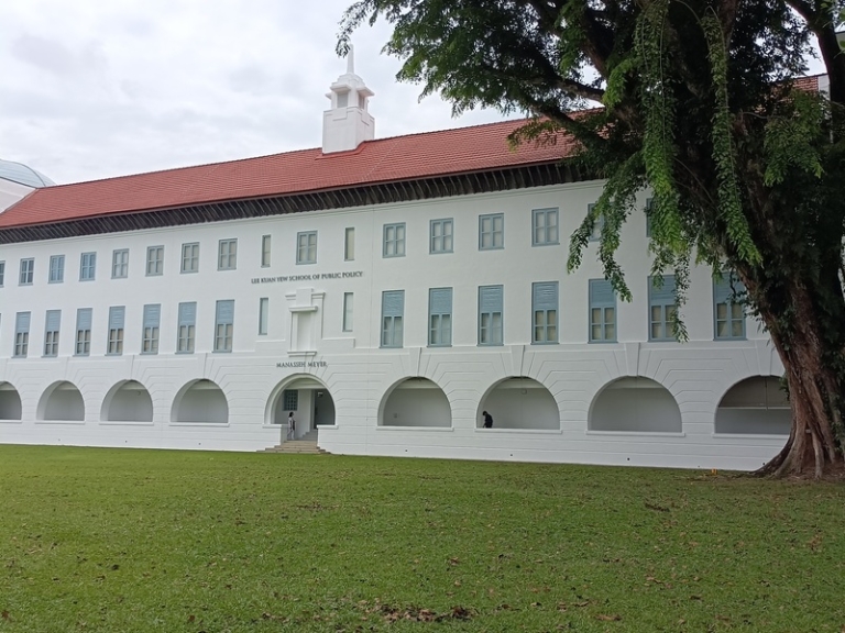 Work pass for postdoctoral researchers in Singapore, NUS university campus building